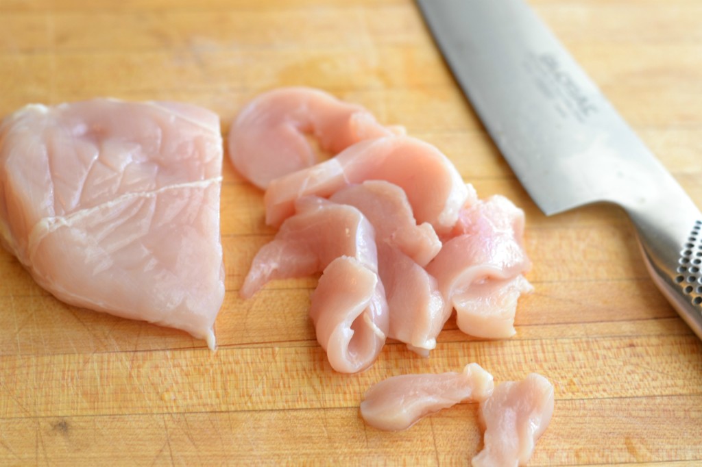 Sliced chicken on a cutting board