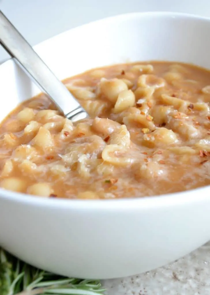 Pasta e Fagioli with grated parmesan cheese melted on top