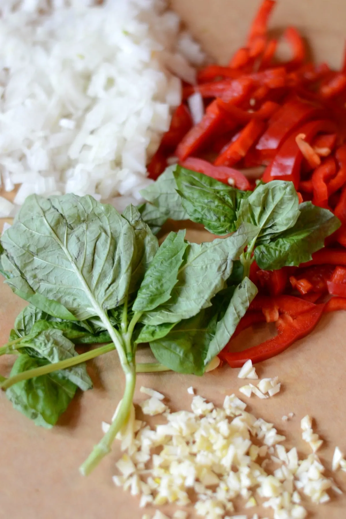 Basil, garlic, red pepper, and onion chopped and ready