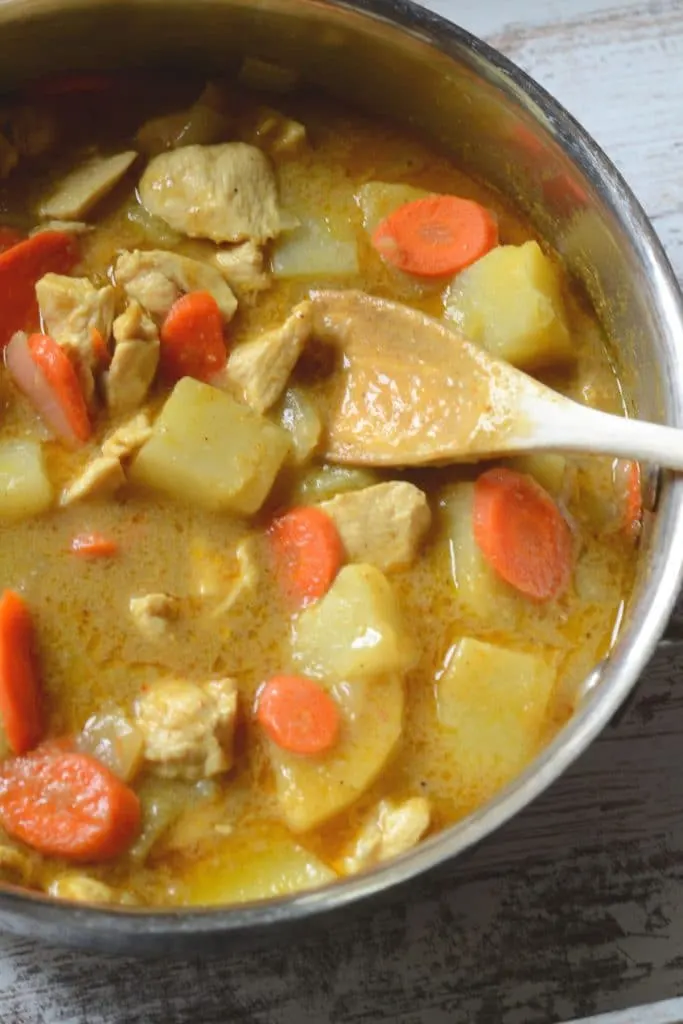 Thai curry simmering in a pan