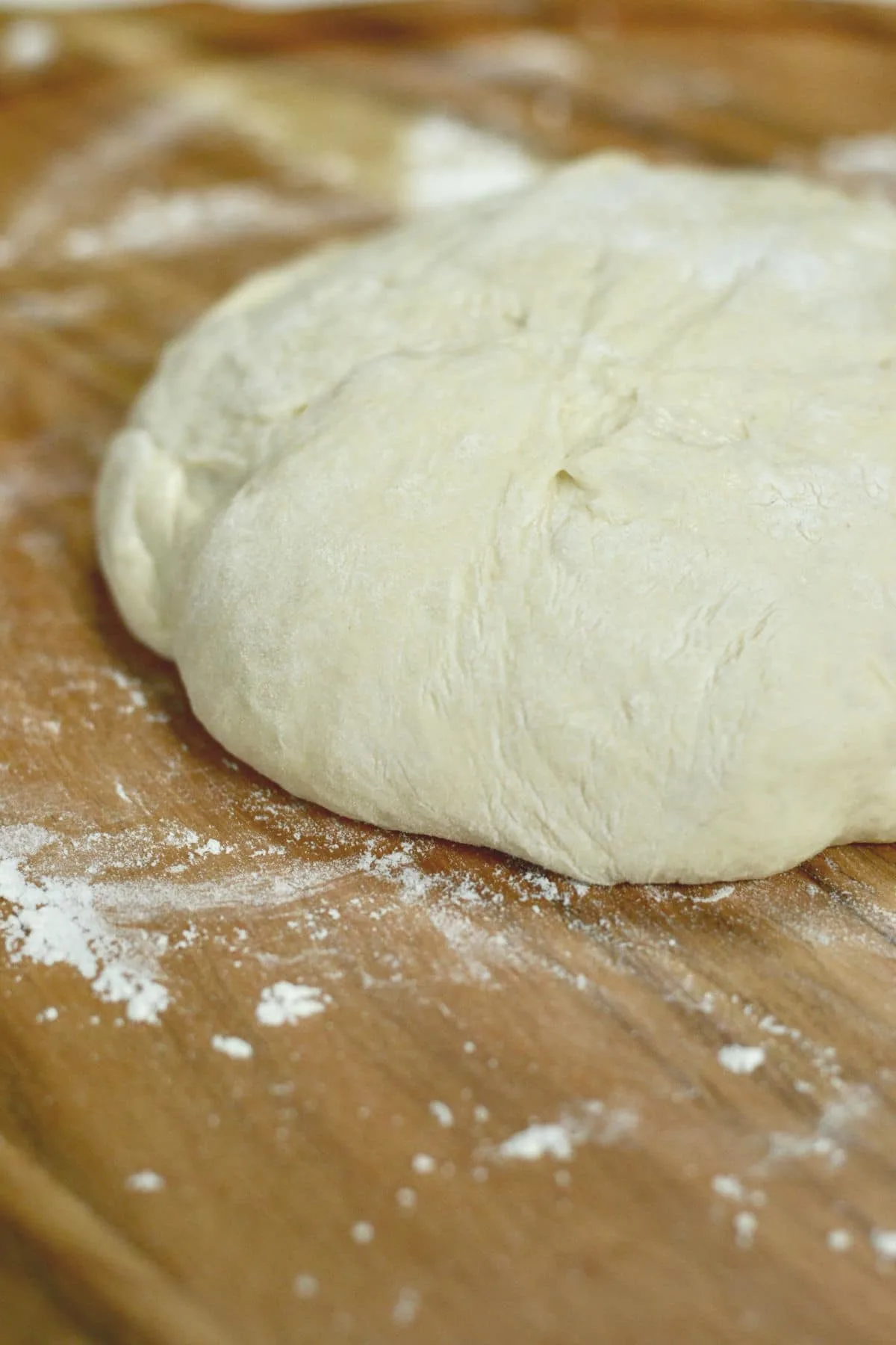 Store-bought pizza dough sitting out to come to room temperature.