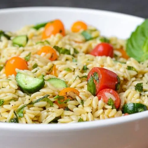 Close up of bowl of orzo salad.