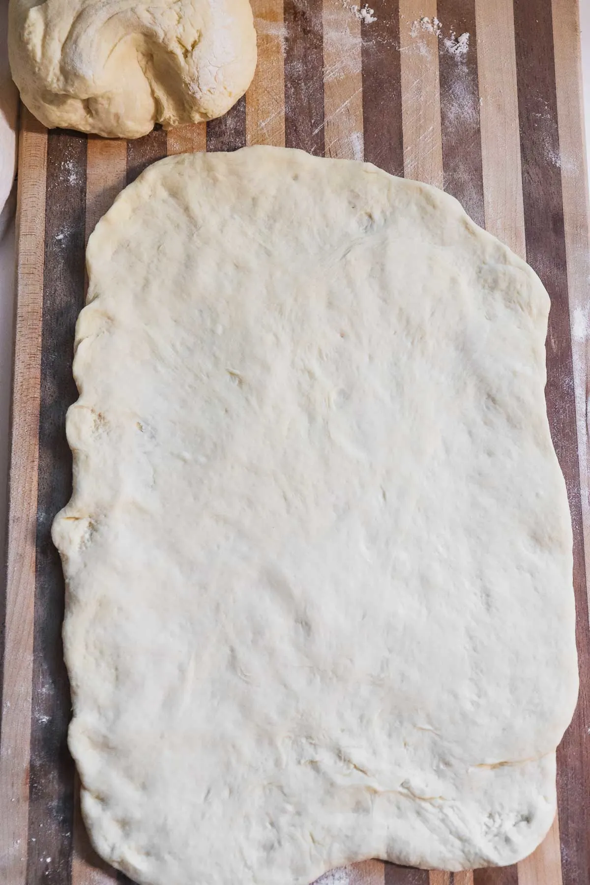 Rolled out pizza dough for pinwheels