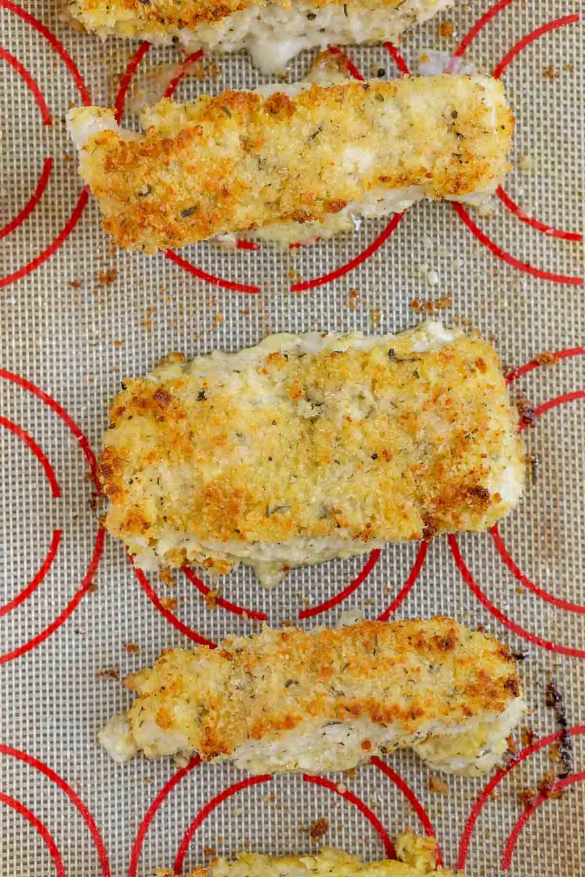 Close up of baked breaded cod fillets