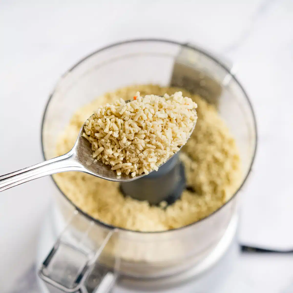 Crumbled ramen noodles in a food processor