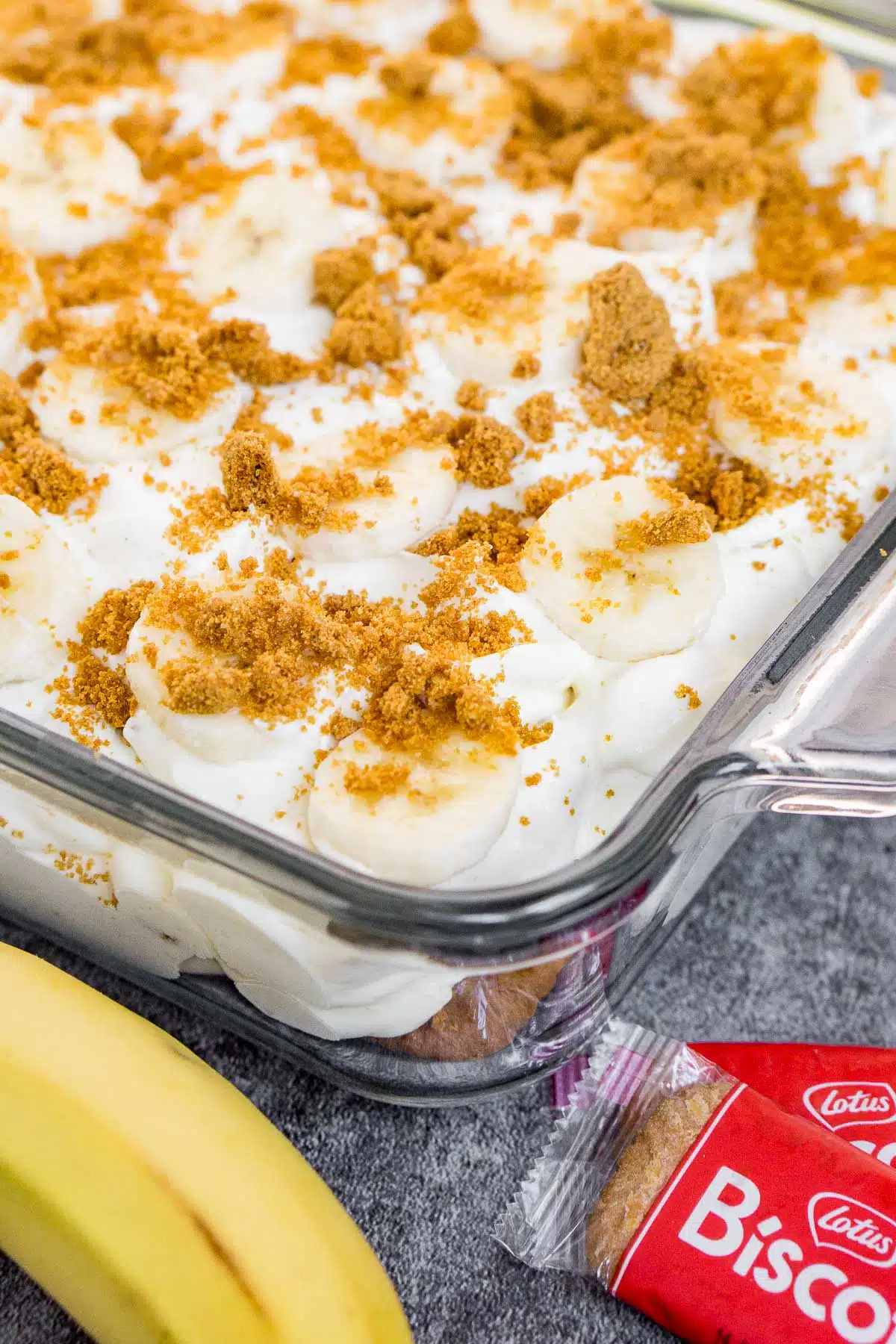Close up of a dish of Biscoff banana pudding to show texture and layers
