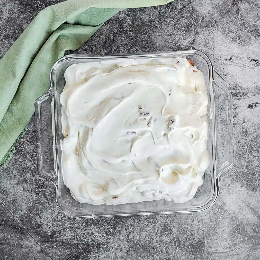 Layering banana pudding on top of Biscoff cookies