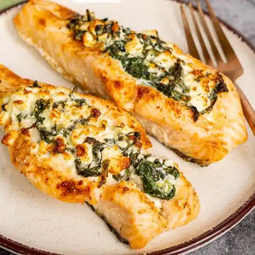 Spinach feta stuffed salmon on a plate