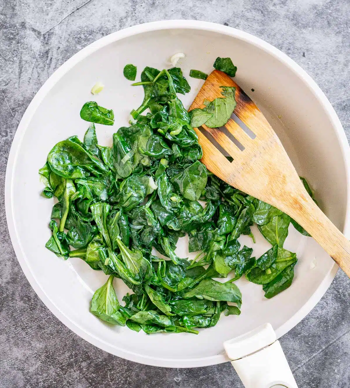 Wilted spinach in a skillet