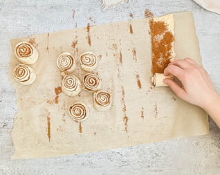Rolling up crescent roll cinnamon roll dough