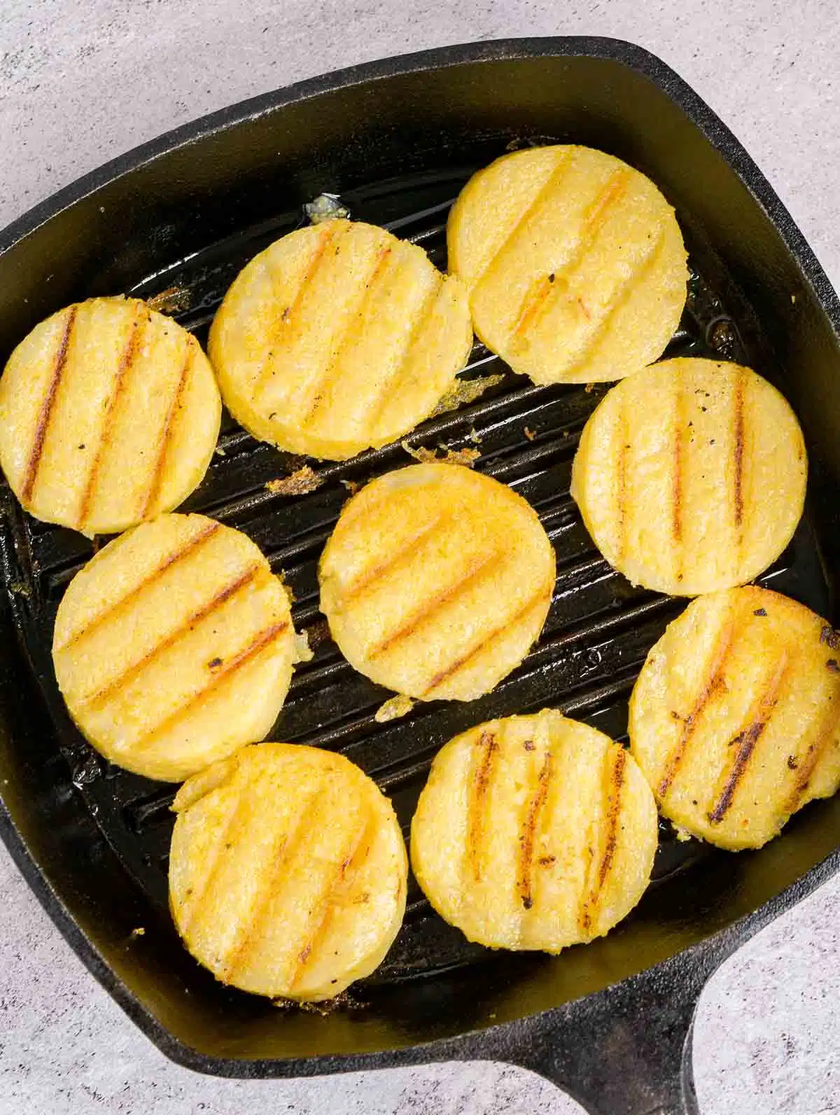 Sliced polenta on a grill pan