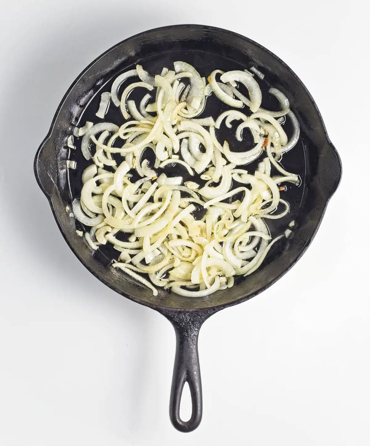 Sauteed onions in a skillet