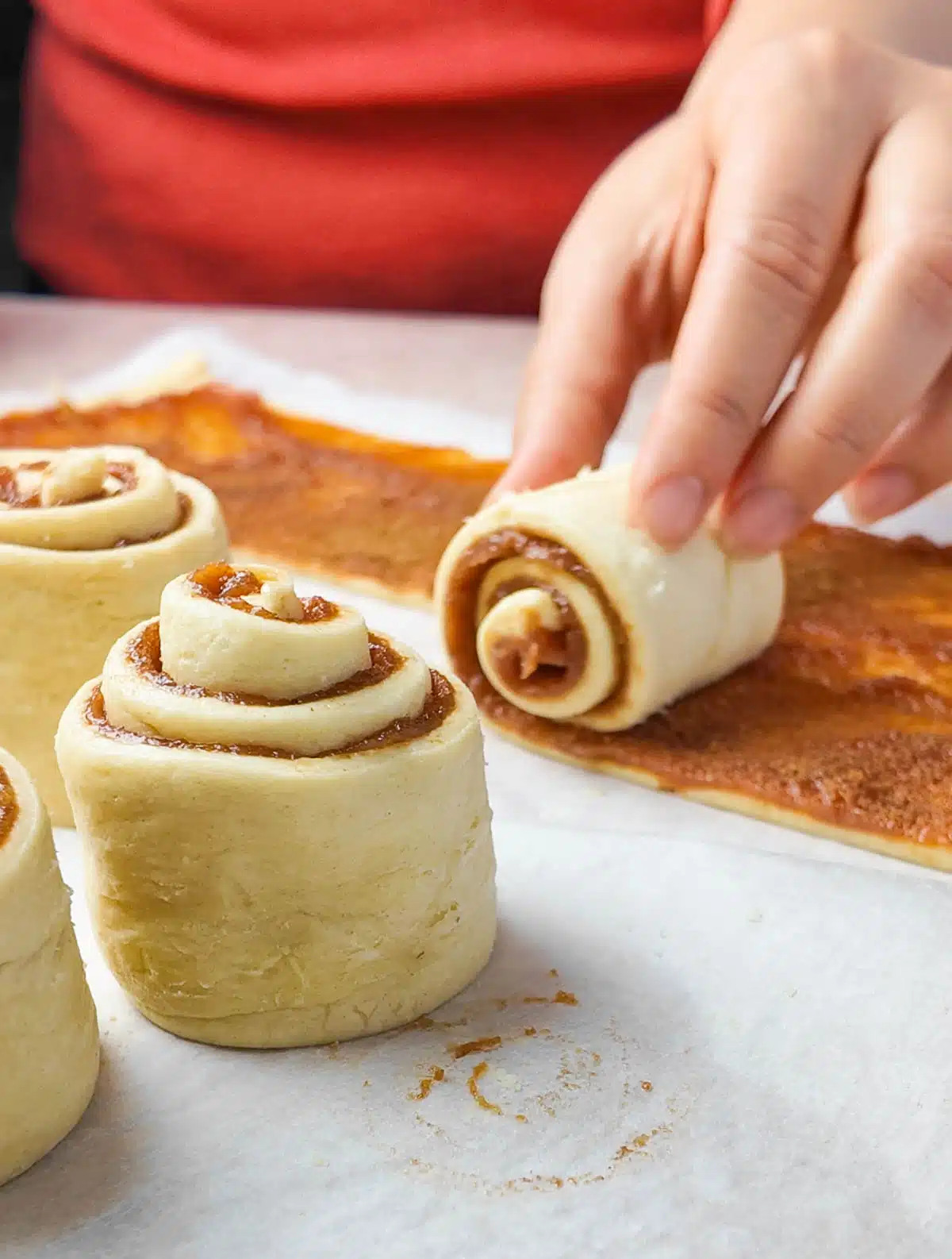 Rolling crescent roll dough cinnamon rolls